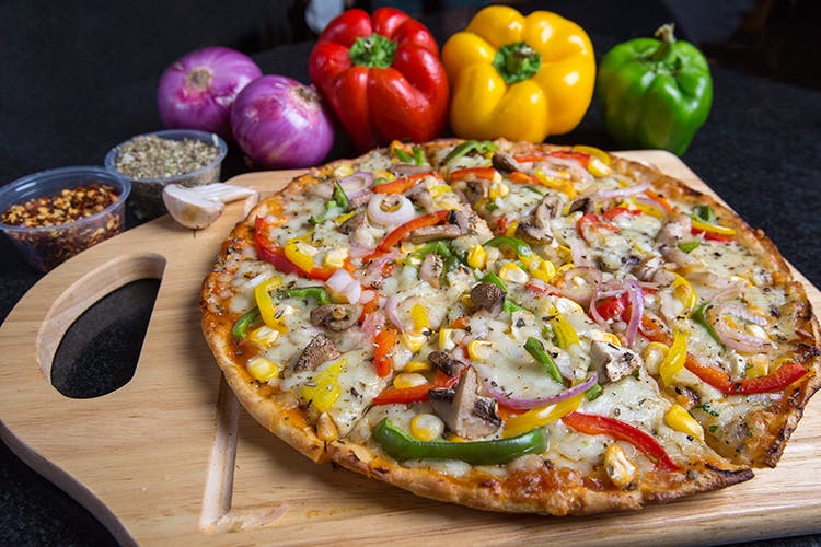 Dish,Food,Cuisine,Pizza,California-style pizza,Ingredient,Pizza cheese,Flatbread,Italian food,Tarte flambée