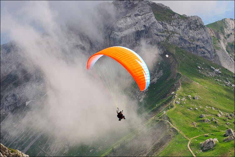 Paragliding,Air sports,Windsports,Parachuting,Parachute,Nature,Extreme sport,Hill station,Sky,Mountain range