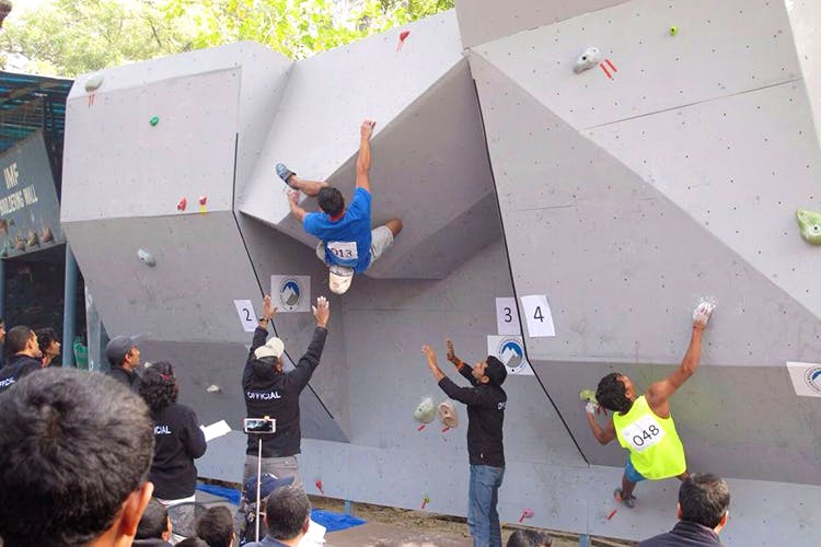 Climbing hold,Climbing,Bouldering,Adventure,Sport climbing,Rock climbing,Recreation,Climbing shoe,Competition event,Individual sports