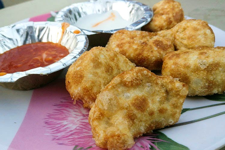 Dish,Food,Cuisine,Ingredient,Fried food,Fast food,Chicken nugget,Fritter,Prawn ball,Baked goods
