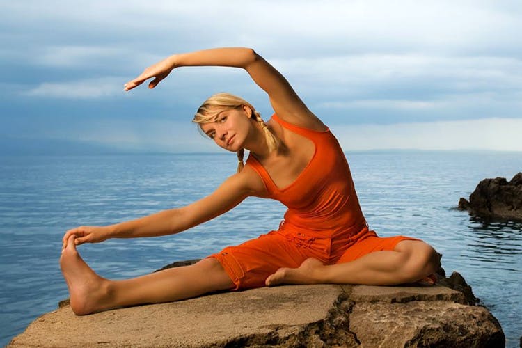 People in nature,Physical fitness,Yoga,Stretching,Muscle,Happy,Leg,Sea,Photography,Flash photography