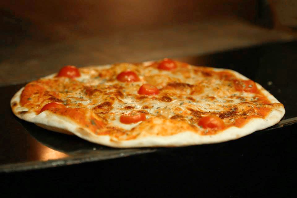 Dish,Food,Cuisine,Pizza,Pizza cheese,Flatbread,Ingredient,Tarte flambée,California-style pizza,Sicilian pizza