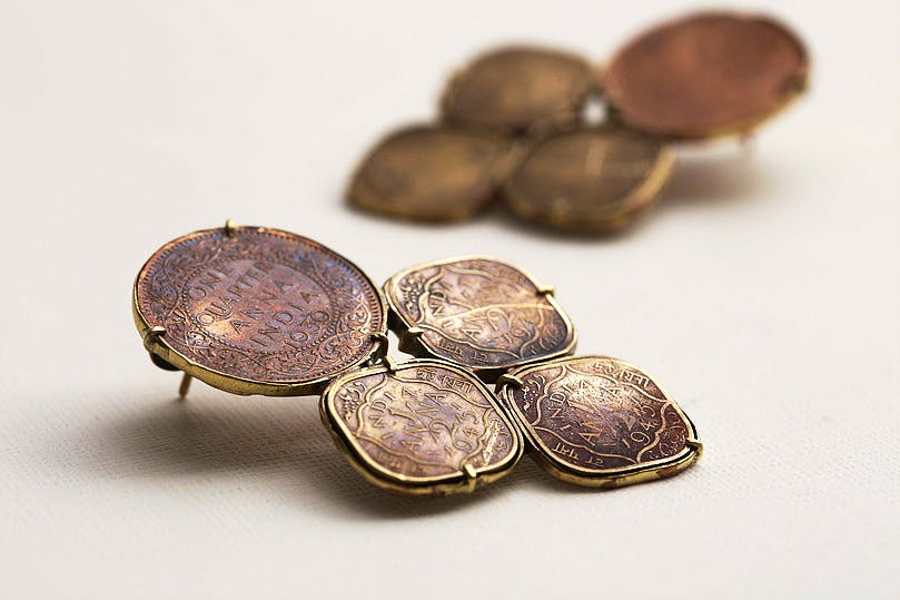 Coin,Saving,Metal,Fashion accessory,Brass,Quarter,Money