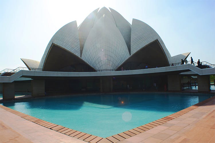 Architecture,Sky,Building,Vacation,House,Reflecting pool,Swimming pool,Tourism,Symmetry,Leisure