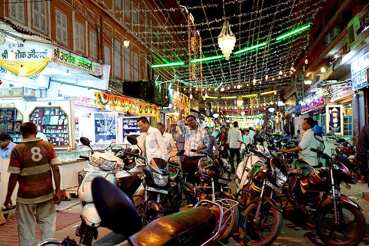 Bazaar,Market,Public space,Marketplace,City,Human settlement,Town,Mode of transport,Street,Night