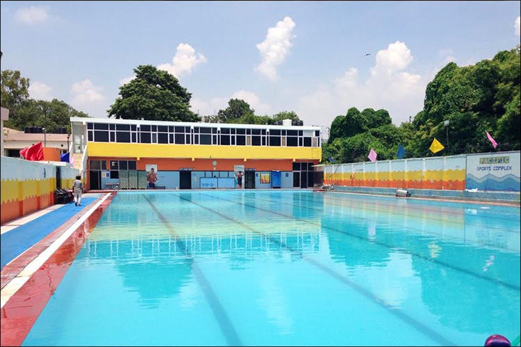 Swimming pool,Leisure centre,Leisure,Water park,Recreation,Fun,Building,Swimming,Vacation,Park