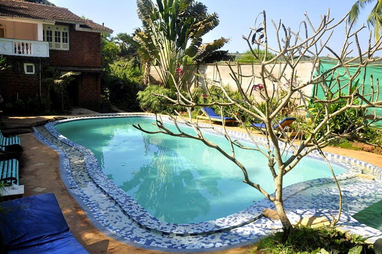 Swimming pool,Resort,Leisure,Eco hotel,Resort town,Backyard,Vacation,Landscape,House,Hotel