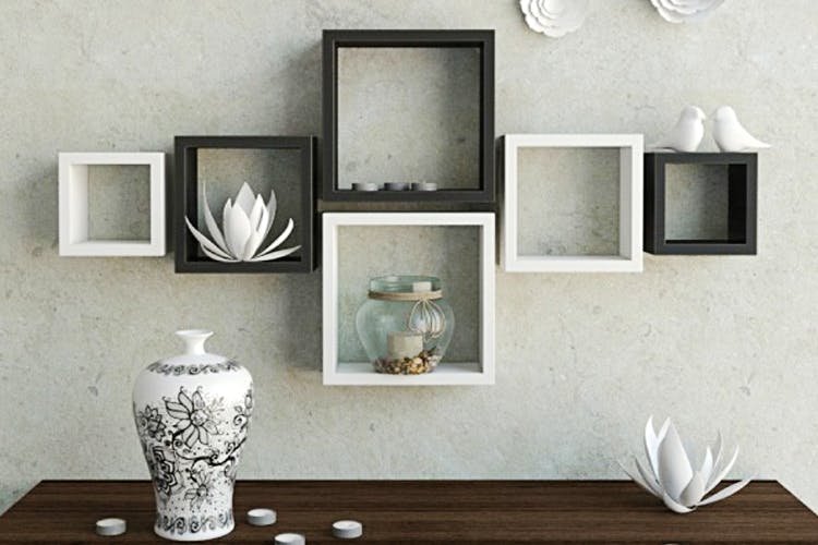 Shelf,Shelving,Wall,Furniture,Still life photography,Room,Interior design,Table,Photography,Picture frame