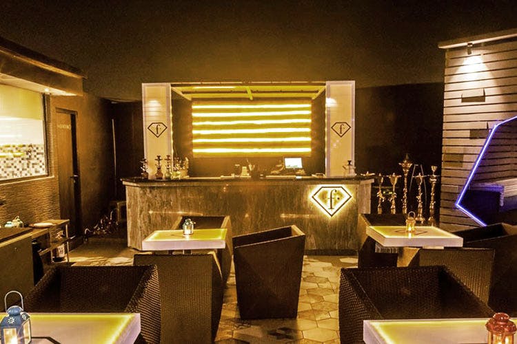 Room,Interior design,Property,Building,Furniture,Lighting,Architecture,Restaurant,Ceiling,House