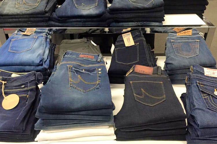 Jeans,Denim,Clothing,Trousers,Textile,Brand,Hand luggage,Pocket,Baggage
