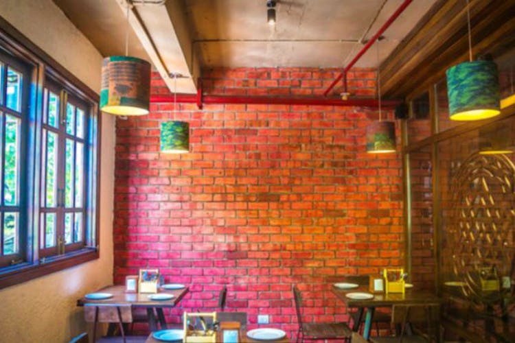 Restaurant,Building,Brick,Interior design,Room,Wall,Architecture,Brickwork,Tavern,Bar