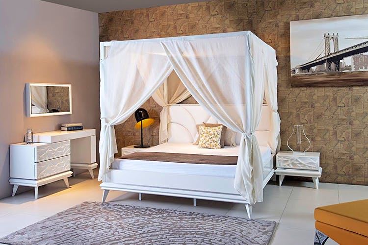 Furniture,Bed,Bedroom,Room,Canopy bed,Property,Bed sheet,Mattress,Interior design,Suite