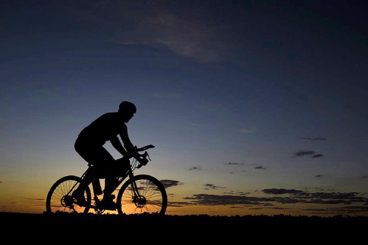 Cycling,Bicycle,Sky,Cycle sport,Vehicle,Recreation,Mountain bike,Cloud,Silhouette,Endurance sports