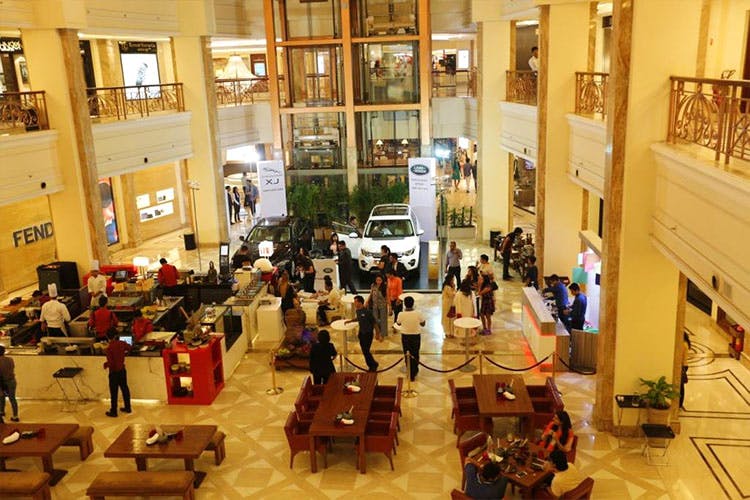 Building,Shopping mall,Lobby,Event,Shopping,Service,Crowd