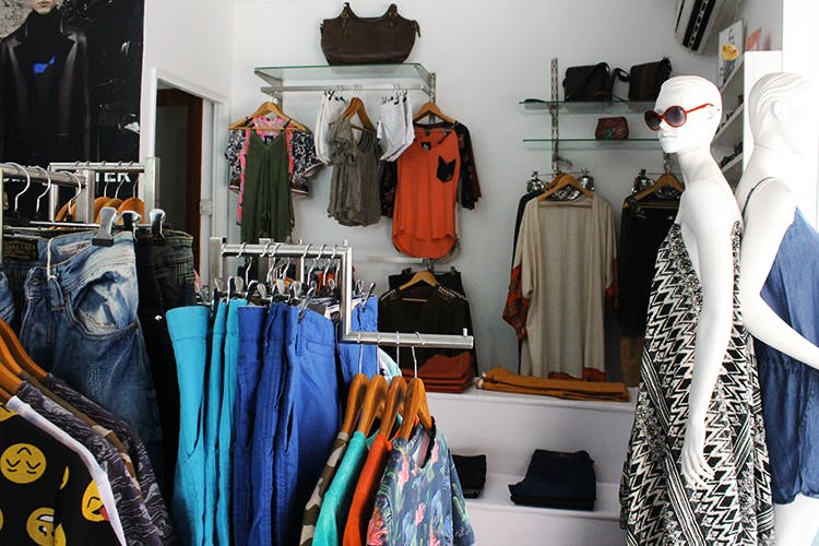 Boutique,Room,Closet,Clothes hanger,Fashion,Wardrobe,Furniture,Shelf,Costume design,Collection