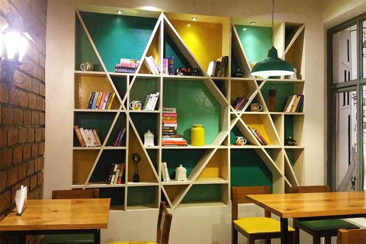 Shelf,Shelving,Furniture,Bookcase,Room,Interior design,Design,Building,Wood,Ladder