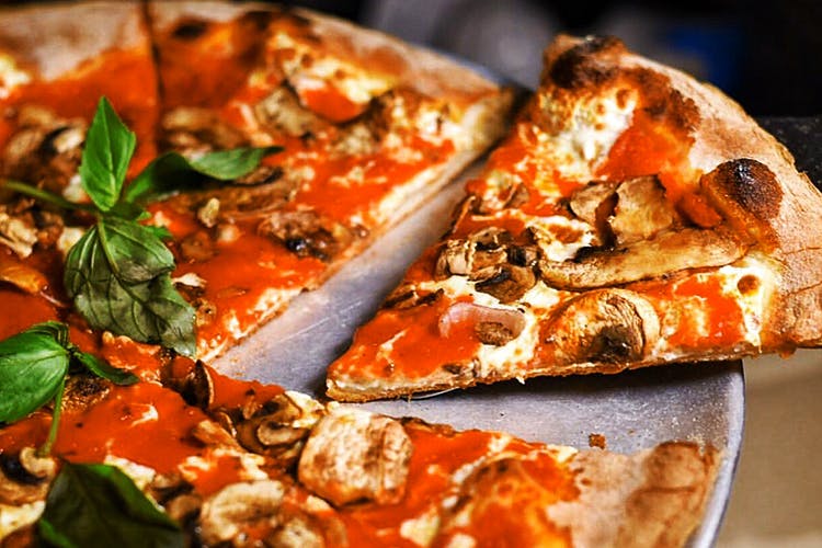 Dish,Food,Cuisine,Pizza,Pizza cheese,Ingredient,Flatbread,California-style pizza,Italian food,Tarte flambée
