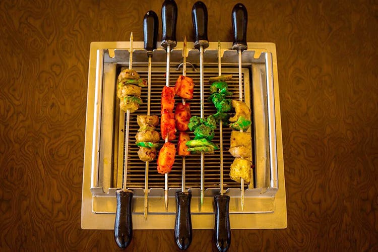 Skewer,Shashlik,Brochette,Finger food,Kebab,Food,Cuisine,Still life photography,Grilling,Dish