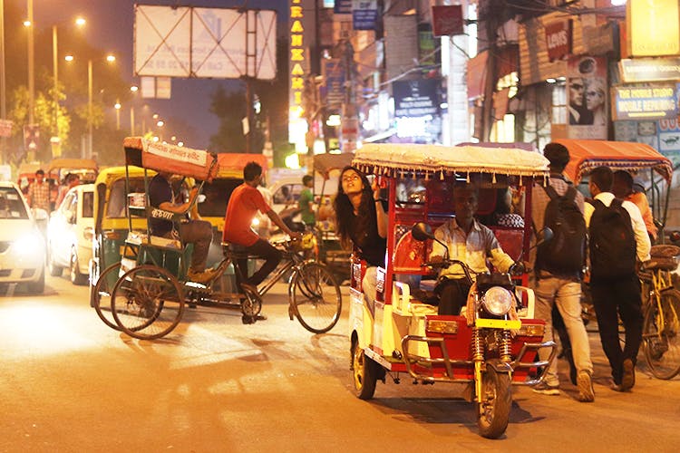 Mode of transport,Rickshaw,Vehicle,Transport,Street,Cart,Urban area,Night,Hawker,Market