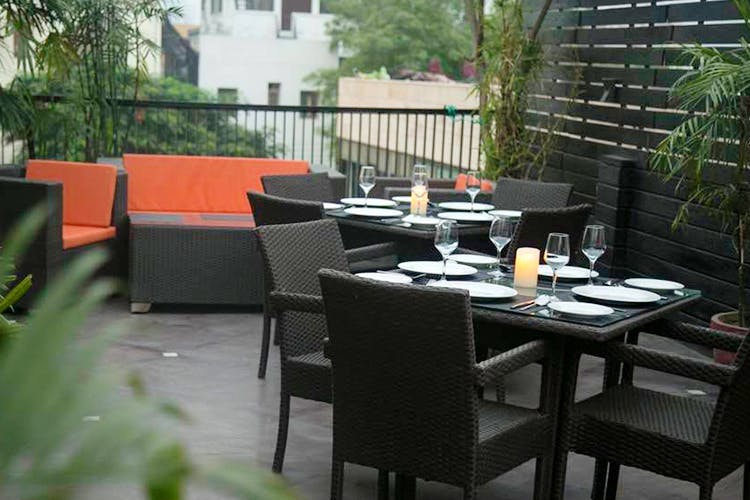 Restaurant,Furniture,Property,Table,Patio,Chair,Room,Interior design,Backyard,Building