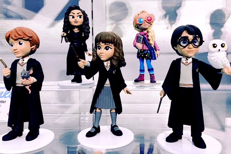 Cartoon,Animated cartoon,Illustration,Action figure,Animation,Anime,Black hair,Fictional character,Team,Figurine