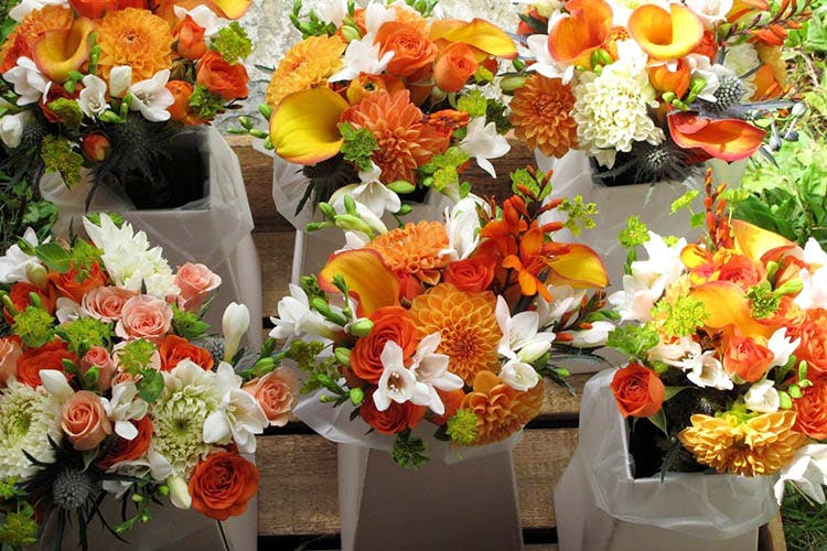 Flower,Flower Arranging,Floristry,Bouquet,Cut flowers,Floral design,Orange,Plant,Artificial flower,Flowerpot