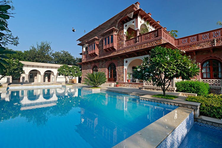 Swimming pool,Property,Building,Estate,Real estate,House,Home,Villa,Architecture,Hacienda