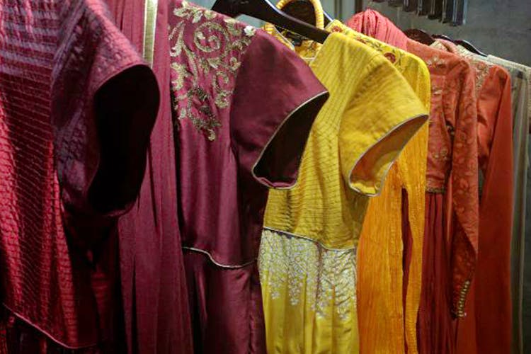 Clothing,Maroon,Robe,Magenta,Textile,Outerwear,Room,Cope,Nightwear,Vestment
