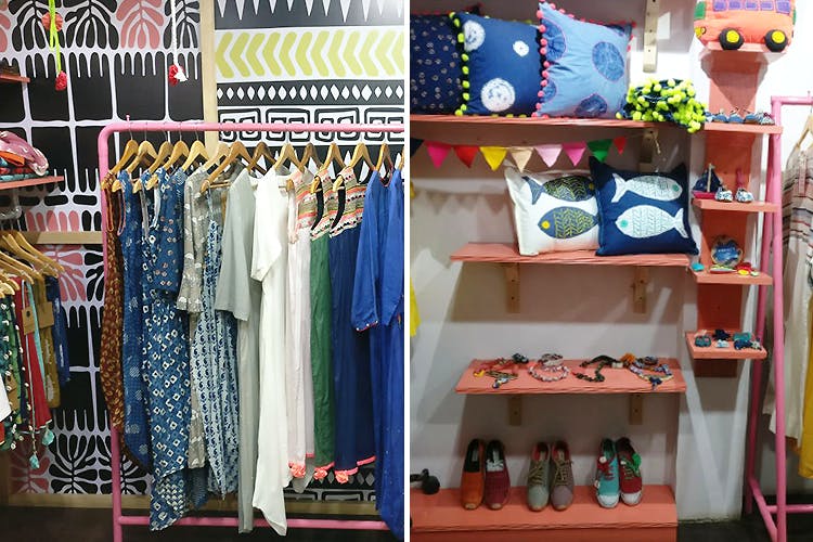 Boutique,Room,Closet,Shelf,Outlet store,Textile,Bazaar,Wardrobe,Furniture,Shelving