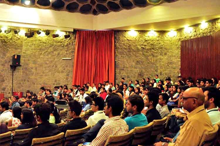 Audience,Event,Academic conference,Convention,Auditorium,Crowd,Theatre,Stage,Conference hall,Performance