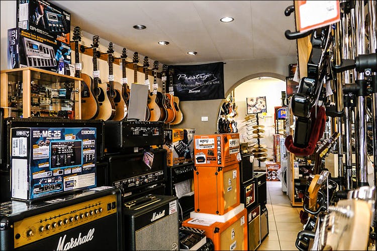 Guitar shop near me open deals today