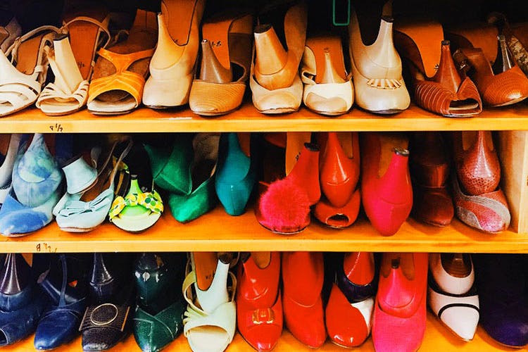 Footwear,Shoe store,Shoe,Orange,Athletic shoe,Boot,Collection