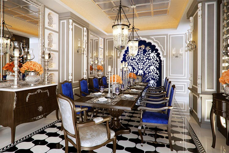 Dining room,Room,Interior design,Blue,Property,Furniture,Building,Table,Ceiling,Blue and white porcelain