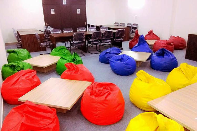 Red,Bean bag,Room,Bean bag chair,Furniture,Play,Plastic,Table