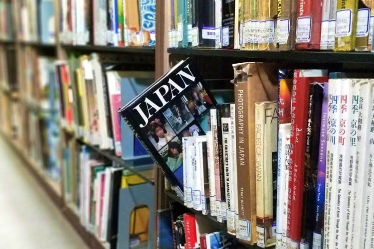 Bookcase,Shelving,Shelf,Book,Library,Bookselling,Publication,Retail,Public library,Furniture