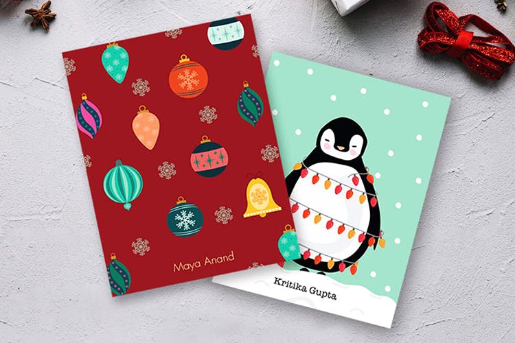 Snowman,Penguin,Flightless bird,Christmas,Greeting card,Present,Paper,Fictional character,Christmas eve,Illustration
