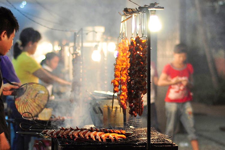 Barbecue,Grilling,Street food,Food,Roasting,Skewer,Cuisine,Barbecue grill,Cooking,Churrasco food