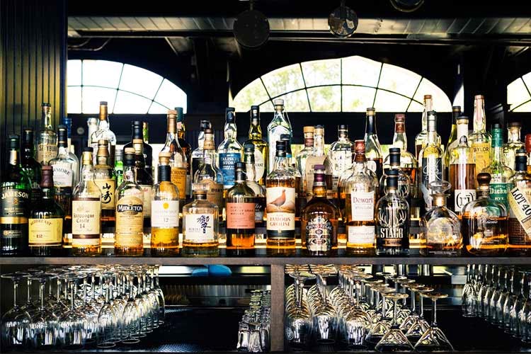 Alcohol,Bar,Drink,Distilled beverage,Alcoholic beverage,Liqueur,Glass bottle,Whisky,Pub,Liquor store