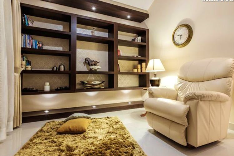 Living room,Furniture,Room,Interior design,Property,Shelf,Shelving,Building,Floor,Wall