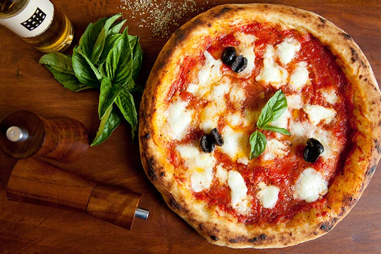 Dish,Food,Pizza,Cuisine,Pizza cheese,Ingredient,Flatbread,Italian food,Produce,Recipe
