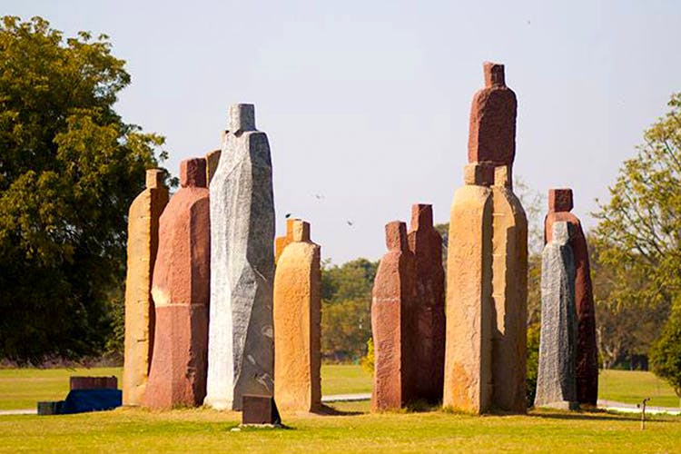Sculpture,Rock,Monolith,Landmark,Historic site,Monument,Megalith,Ancient history,Art,Grass