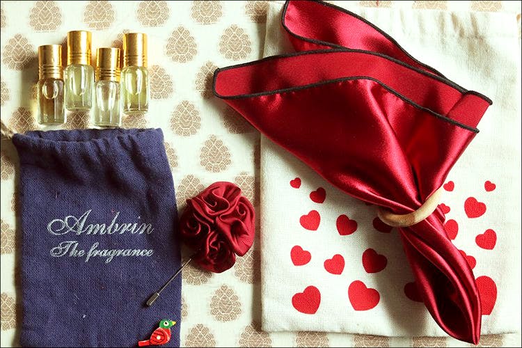 Red,Textile,Napkin,Rose,Linens,Rose family,Flower,Plant,Handkerchief,Fashion accessory
