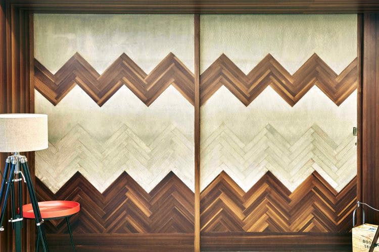 Wall,Interior design,Wallpaper,Room,Pattern,Textile,Wood,Curtain,Window treatment,Window covering