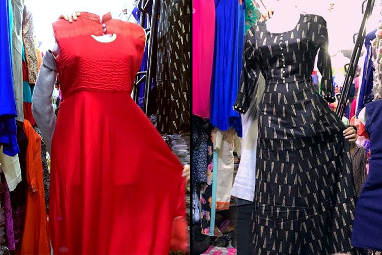 Clothing,Dress,Boutique,Formal wear,Fashion,Shoulder,Gown,Haute couture,Fashion design,Day dress