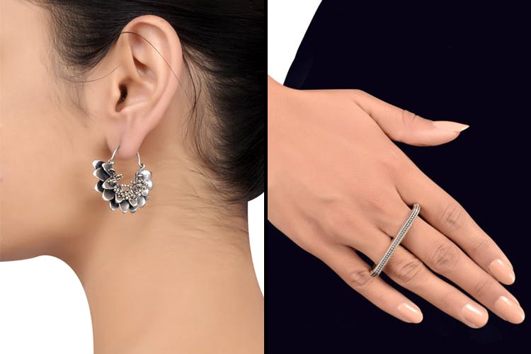 Ear,Jewellery,Fashion accessory,Diamond,Finger,Ring,Body jewelry,Hand,Silver,Neck