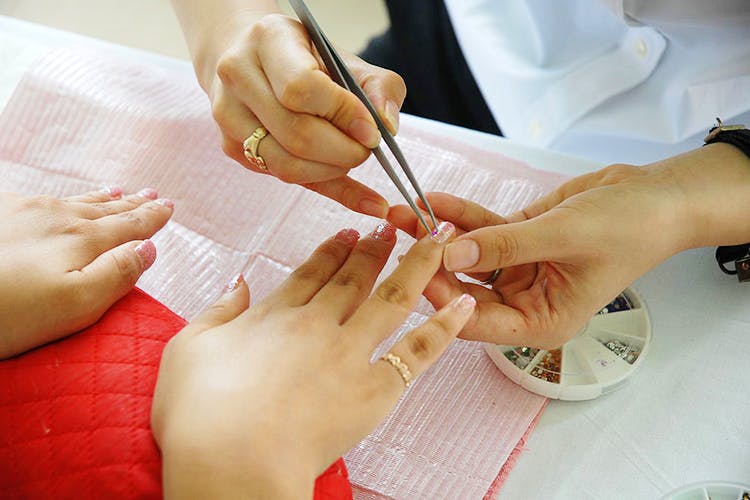 Nail,Manicure,Hand,Nail care,Finger,Skin,Cosmetics,Service,Beauty salon,Artificial nails