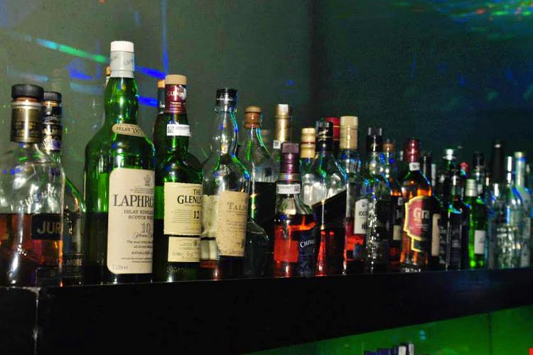Alcohol,Drink,Liqueur,Distilled beverage,Alcoholic beverage,Bottle,Bar,Glass bottle,Whisky,Scotch whisky