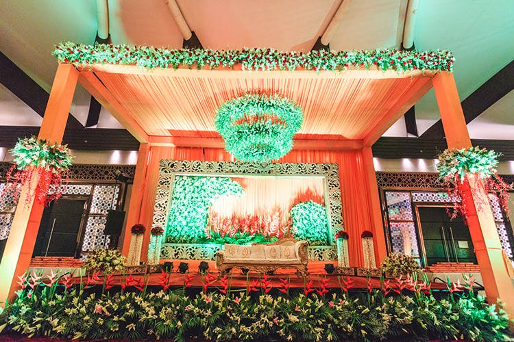 Decoration,Green,Stage,Lighting,Event,Architecture,Ceremony,Wedding reception,Building