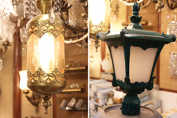 Lighting,Light fixture,Iron,Lamp,Lantern,Interior design,Candle holder,Metal,Room,Antique