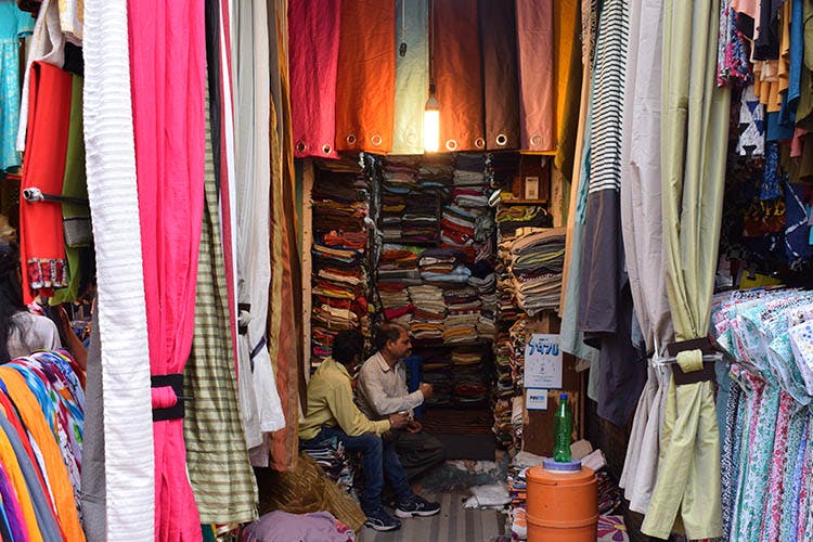 Room,Bazaar,Closet,Boutique,Public space,Textile,Market,Marketplace,Retail,Building